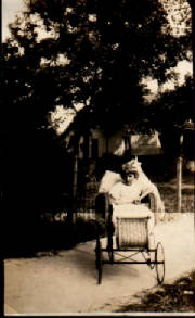 Picture of blond girl in wicker wheelchair