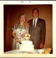 Unidentified couple cutting cake in Jan 1961 jpeg